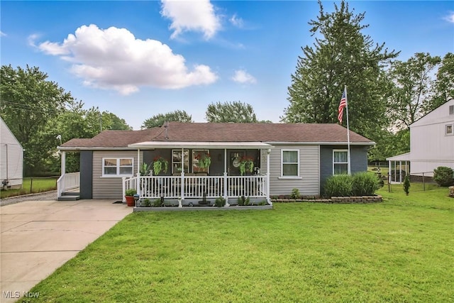 245 N Rd, Niles, OH 44446 - ranch-style home featuring covered porch, a front yard, and concrete driveway