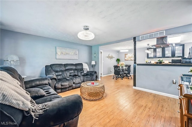 245 N Rd, Niles, OH 44446 - living area with wood finished floors and baseboards