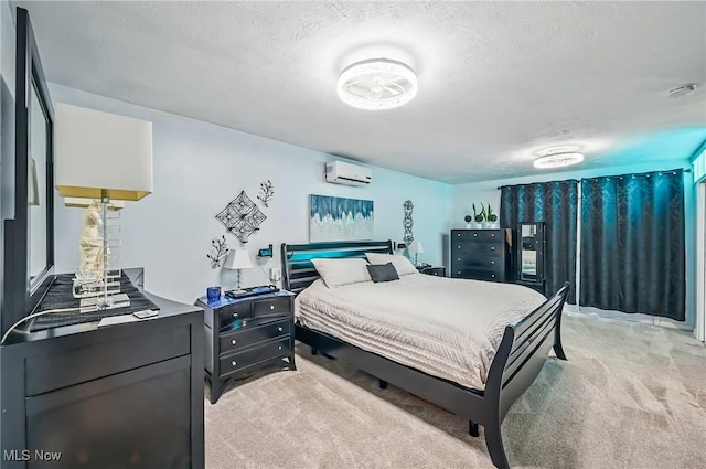 245 N Rd, Niles, OH 44446 - bedroom with an AC wall unit, light carpet, and a textured ceiling