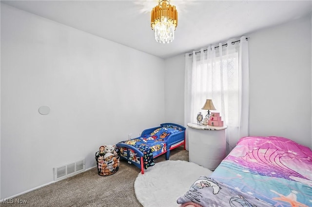 245 N Rd, Niles, OH 44446 - carpeted bedroom featuring a chandelier