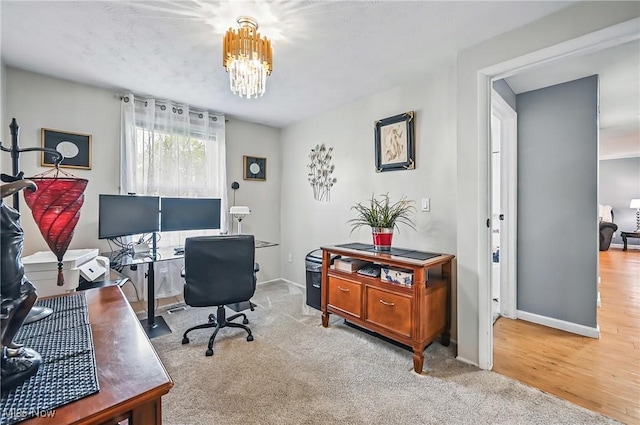 245 N Rd, Niles, OH 44446 - carpeted office space with a chandelier and baseboards