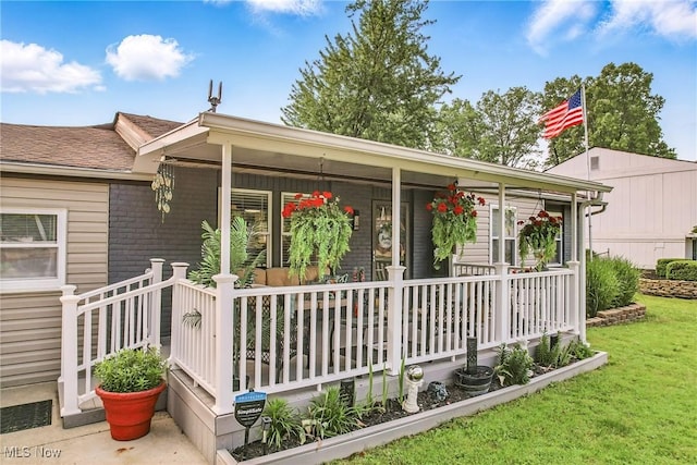 245 N Rd, Niles, OH 44446 - view of front of property with covered porch and a front lawn