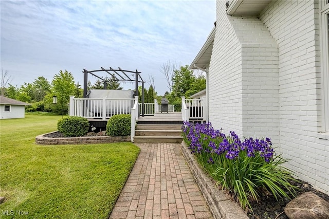 8921 Auburn Rd, Chardon, OH 44024 - view of grassy yard featuring a deck