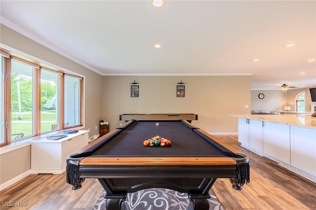 8921 Auburn Rd, Chardon, OH 44024 - game room with light wood-style floors, ornamental molding, healthy amount of natural light, baseboards, and a ceiling fan