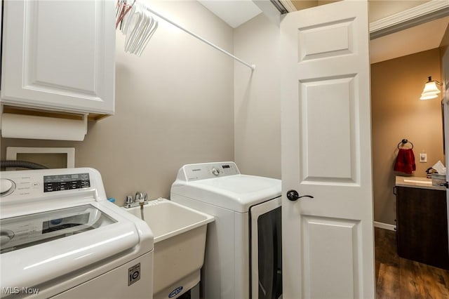 8921 Auburn Rd, Chardon, OH 44024 - laundry room featuring cabinet space, washing machine and clothes dryer, and dark wood-type flooring