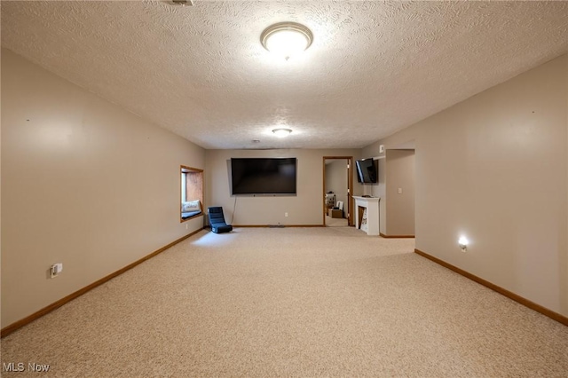 8921 Auburn Rd, Chardon, OH 44024 - finished basement featuring carpet flooring, a textured ceiling, and baseboards