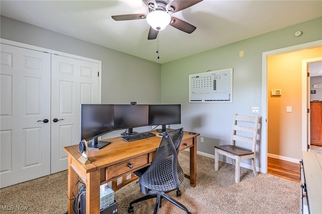8921 Auburn Rd, Chardon, OH 44024 - office area featuring a ceiling fan, baseboards, and light carpet