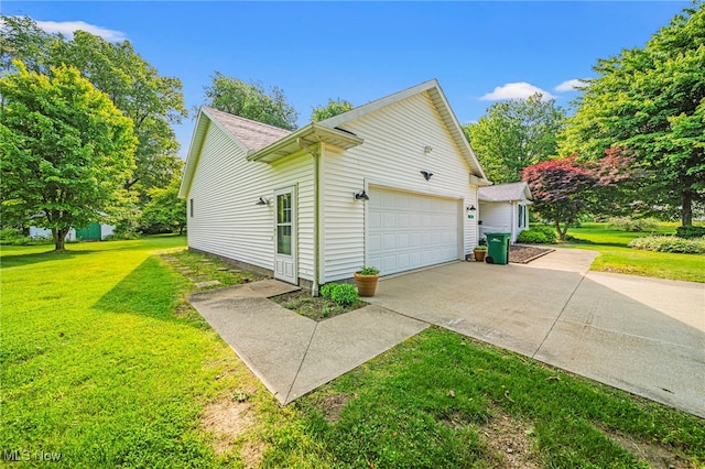 7410 Fieldstone Ave, Conneaut, OH 44030 - view of home's exterior with an attached garage, a lawn, and driveway