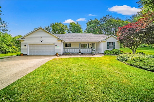 7410 Fieldstone Ave, Conneaut, OH 44030 - single story home with covered porch, an attached garage, a front lawn, and driveway