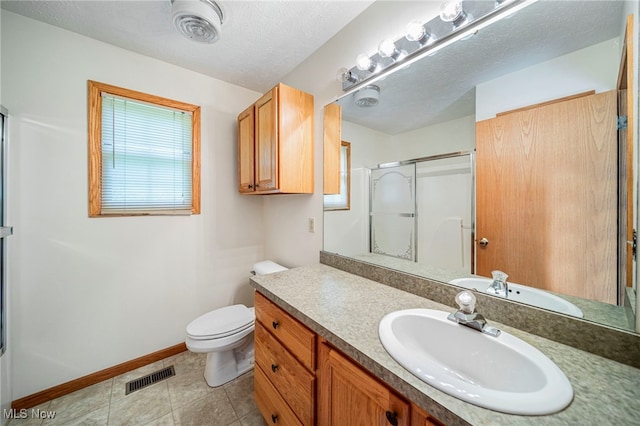 7410 Fieldstone Ave, Conneaut, OH 44030 - bathroom featuring an enclosed shower, vanity, toilet, baseboards, and tile patterned floors