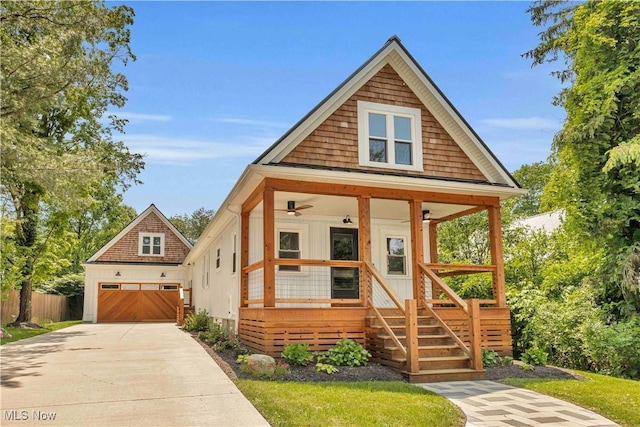 7125 Cedar St, Chagrin Falls, OH 44022 - view of front facade featuring ceiling fan, covered porch, and concrete driveway