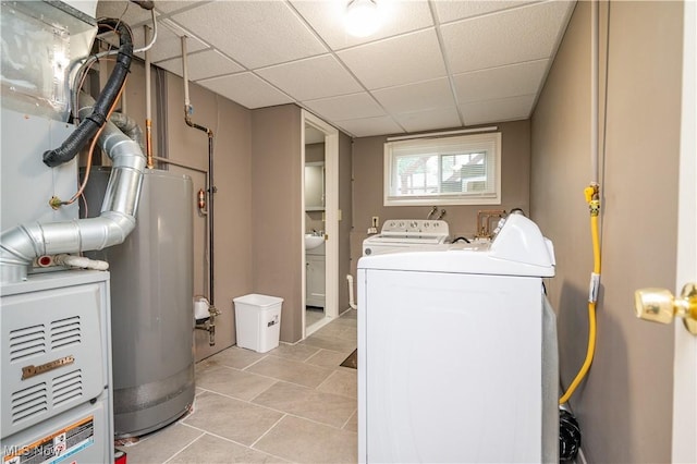 3406 Rebecca Dr, Canfield, OH 44406 - laundry room with washer and dryer and light tile patterned floors