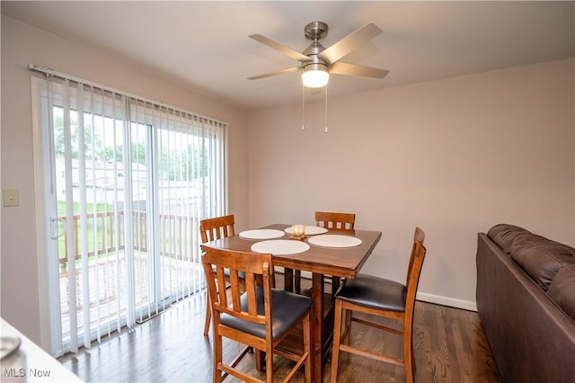 3406 Rebecca Dr, Canfield, OH 44406 - dining space featuring wood finished floors, a ceiling fan, and baseboards