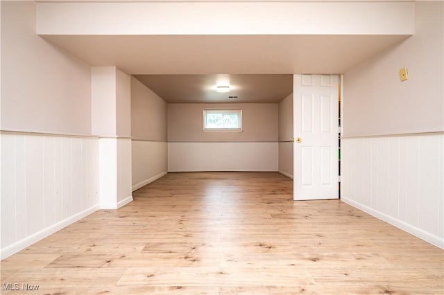 3406 Rebecca Dr, Canfield, OH 44406 - spare room with wood finished floors and a wainscoted wall