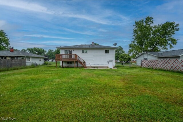 3406 Rebecca Dr, Canfield, OH 44406 - back of property with a wooden deck and stairway