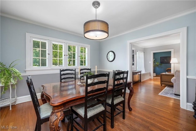 3280 Glencairn Rd, Shaker Heights, OH 44122 - dining room featuring wood finished floors, crown molding, and baseboards