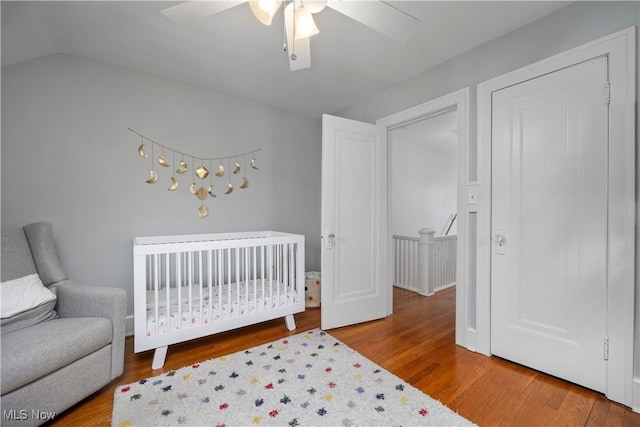 3280 Glencairn Rd, Shaker Heights, OH 44122 - bedroom with wood finished floors, a nursery area, ceiling fan, and lofted ceiling