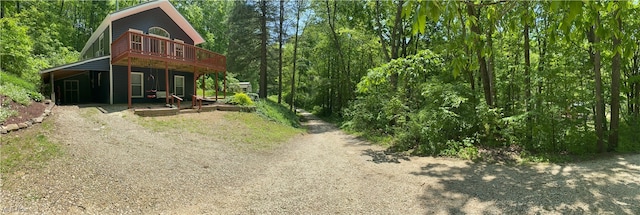 4244 Hensel Dr SW, Carrollton, OH 44615 - view of dirt / gravel driveway with a wooded view