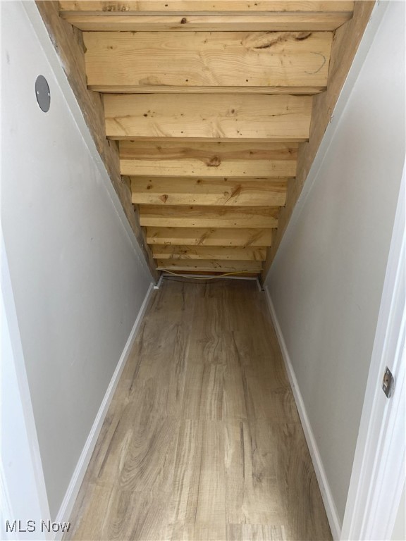 4244 Hensel Dr SW, Carrollton, OH 44615 - corridor featuring wood finished floors and baseboards