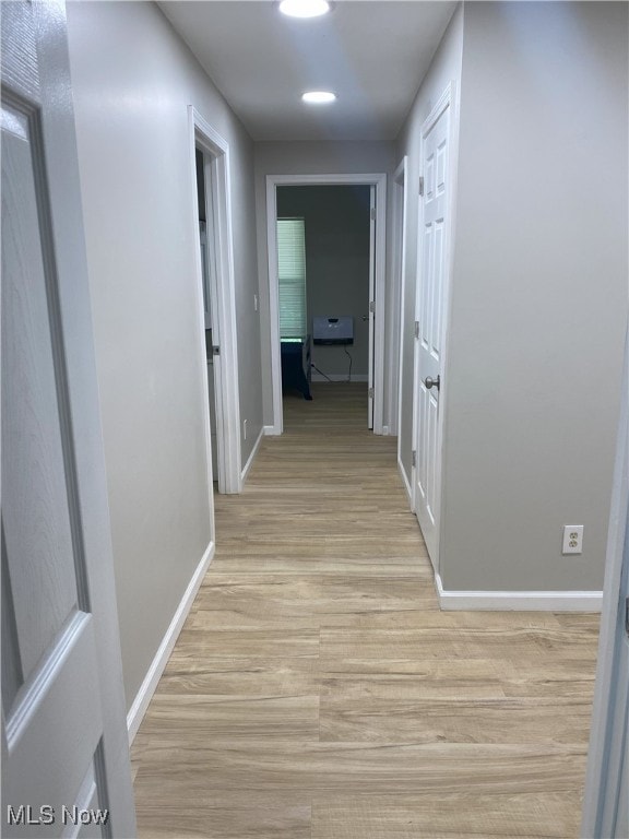 4244 Hensel Dr SW, Carrollton, OH 44615 - hall with light wood finished floors and baseboards
