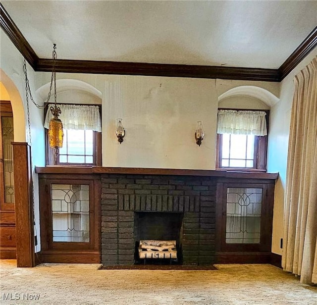 10612 Linnet Ave, Cleveland, OH 44111 - unfurnished living room featuring ornamental molding and a brick fireplace