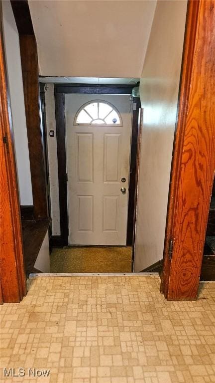 10612 Linnet Ave, Cleveland, OH 44111 - doorway to outside featuring brick patterned floors