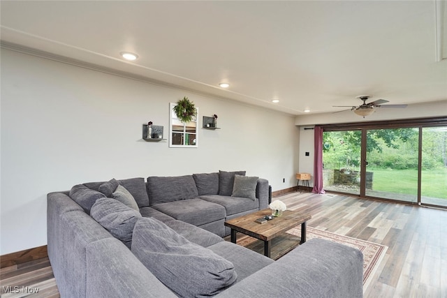 200 Granger Rd, Medina, OH 44256 - living area featuring baseboards, light wood finished floors, a ceiling fan, recessed lighting, and crown molding