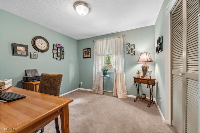 5725 Grove St, Louisville, OH 44641 - carpeted office with baseboards and a textured ceiling