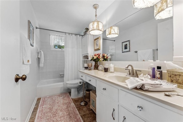 5725 Grove St, Louisville, OH 44641 - bathroom featuring vanity, toilet, and shower / bath combination with curtain
