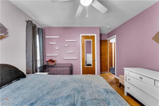 459 Lloyd Rd, Euclid, OH 44132 - bedroom featuring wood finished floors and a ceiling fan