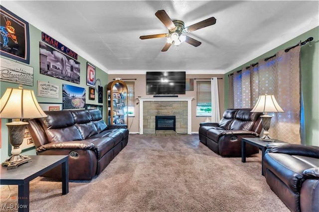 459 Lloyd Rd, Euclid, OH 44132 - carpeted living room with a ceiling fan, a fireplace, and baseboards