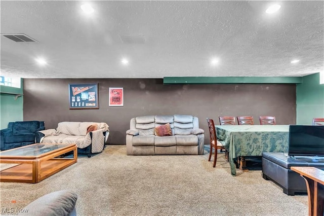 459 Lloyd Rd, Euclid, OH 44132 - carpeted living room featuring a textured ceiling and recessed lighting