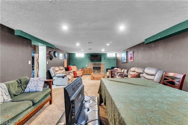 459 Lloyd Rd, Euclid, OH 44132 - living room featuring light carpet, a fireplace, recessed lighting, and a textured ceiling