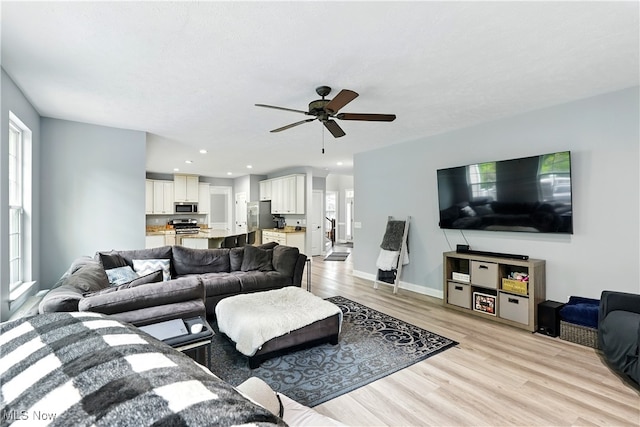 3425 Eryn Pl, Hudson, OH 44236 - living room with a ceiling fan, light wood-type flooring, baseboards, and recessed lighting