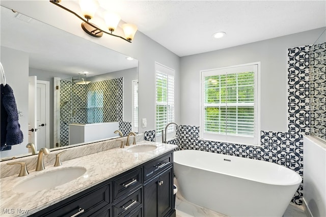 3425 Eryn Pl, Hudson, OH 44236 - bathroom featuring double vanity, a freestanding tub, a stall shower, wainscoting, and marble finish floors