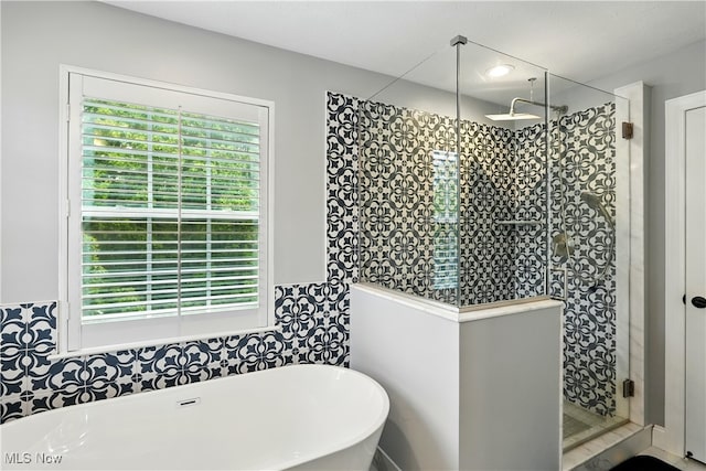 3425 Eryn Pl, Hudson, OH 44236 - bathroom featuring healthy amount of natural light, a freestanding bath, and a stall shower