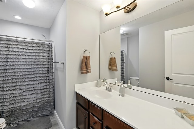 3425 Eryn Pl, Hudson, OH 44236 - bathroom with toilet, vanity, a shower with shower curtain, and baseboards