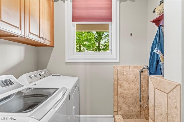 9627 State Route 152, Richmond, OH 43944 - washroom featuring washer and clothes dryer and cabinet space