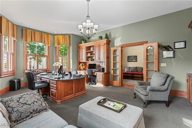 9627 State Route 152, Richmond, OH 43944 - office with dark carpet, a chandelier, built in desk, and baseboards