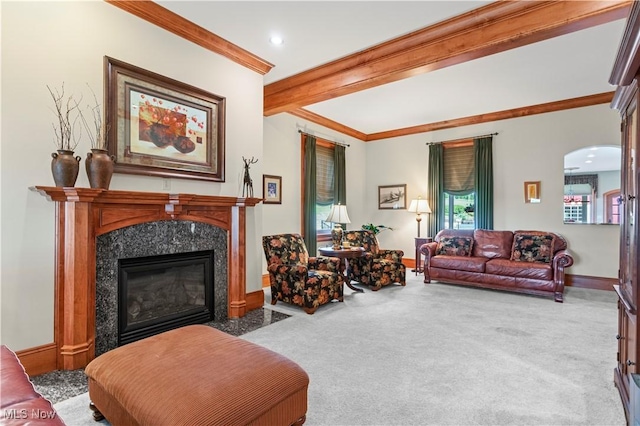 9627 State Route 152, Richmond, OH 43944 - carpeted living room featuring crown molding, beam ceiling, a premium fireplace, arched walkways, and baseboards