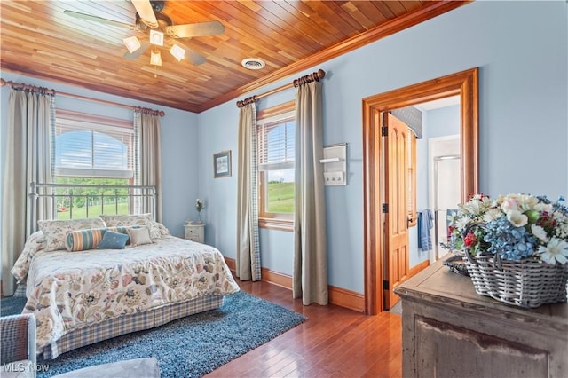 9627 State Route 152, Richmond, OH 43944 - bedroom with ornamental molding, multiple windows, hardwood / wood-style floors, baseboards, and wood ceiling