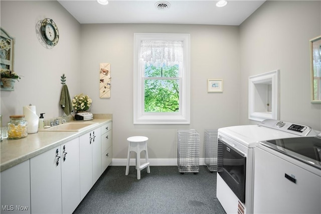 9627 State Route 152, Richmond, OH 43944 - laundry room with independent washer and dryer, cabinet space, dark carpet, baseboards, and recessed lighting