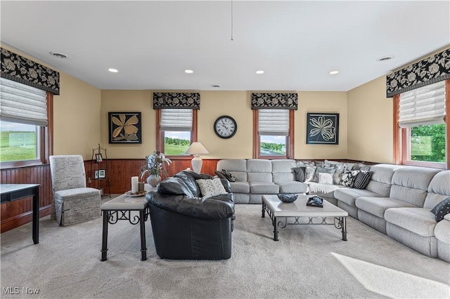 9627 State Route 152, Richmond, OH 43944 - carpeted living room with plenty of natural light, a wainscoted wall, and recessed lighting