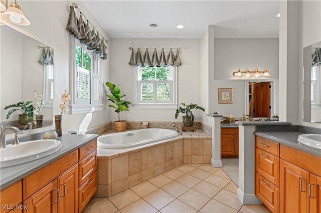 9627 State Route 152, Richmond, OH 43944 - bathroom featuring two vanities, tile patterned flooring, and a garden tub