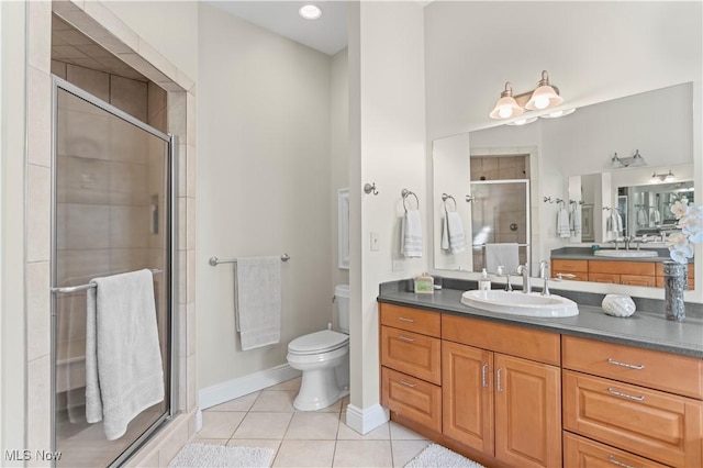 9627 State Route 152, Richmond, OH 43944 - full bath with tile patterned flooring, vanity, toilet, a shower stall, and baseboards
