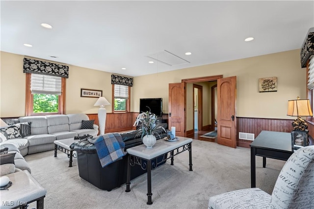 9627 State Route 152, Richmond, OH 43944 - living room with attic access, light carpet, a wainscoted wall, recessed lighting, and wood walls
