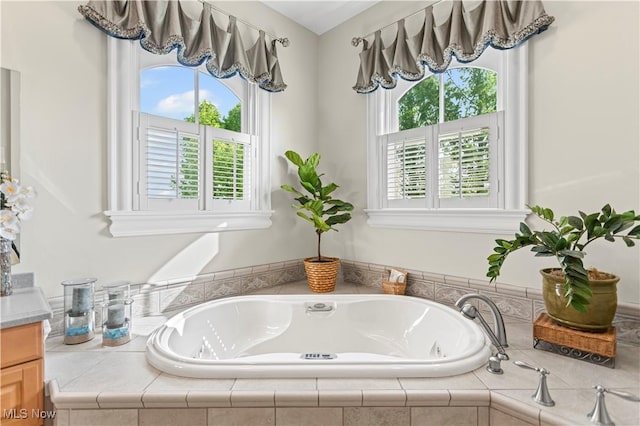9627 State Route 152, Richmond, OH 43944 - bathroom with vanity and a garden tub