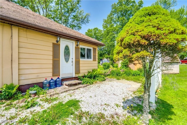 4944 Coleman Dr, Akron, OH 44319 - view of exterior entry with a lawn