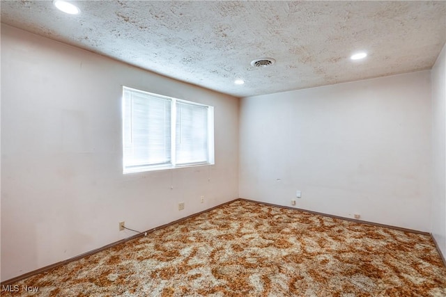 4944 Coleman Dr, Akron, OH 44319 - carpeted spare room with recessed lighting, baseboards, and a textured ceiling