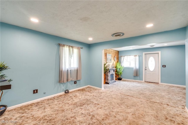4944 Coleman Dr, Akron, OH 44319 - carpeted entrance foyer with recessed lighting and baseboards